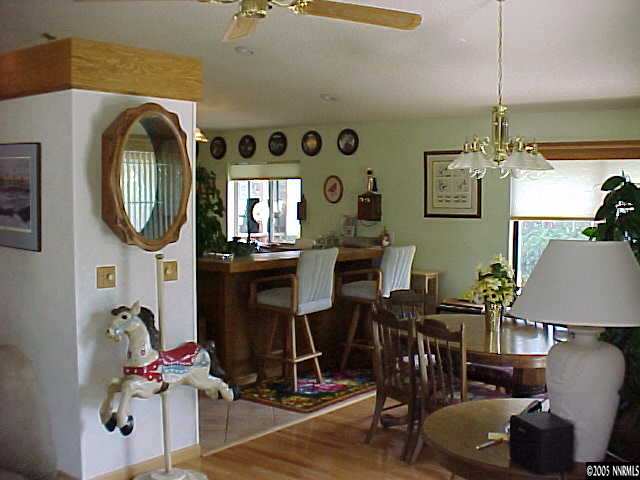13180 Fellowship Way Reno, NV 89511 - Photo 8 of 9 a view of hall way with furniture and chandelier