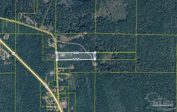 a bathroom with a small space and a wooden floor