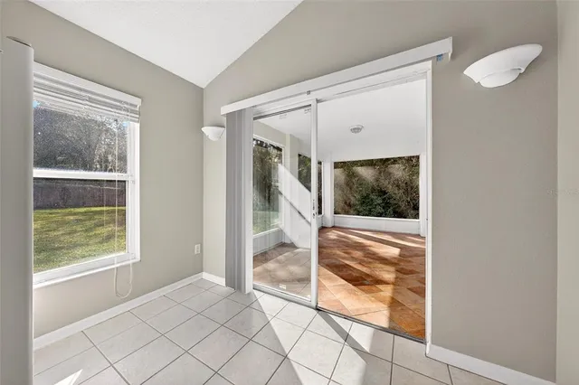 a view of a room with a large window