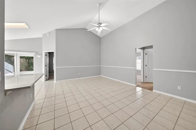 a view of an empty room and window