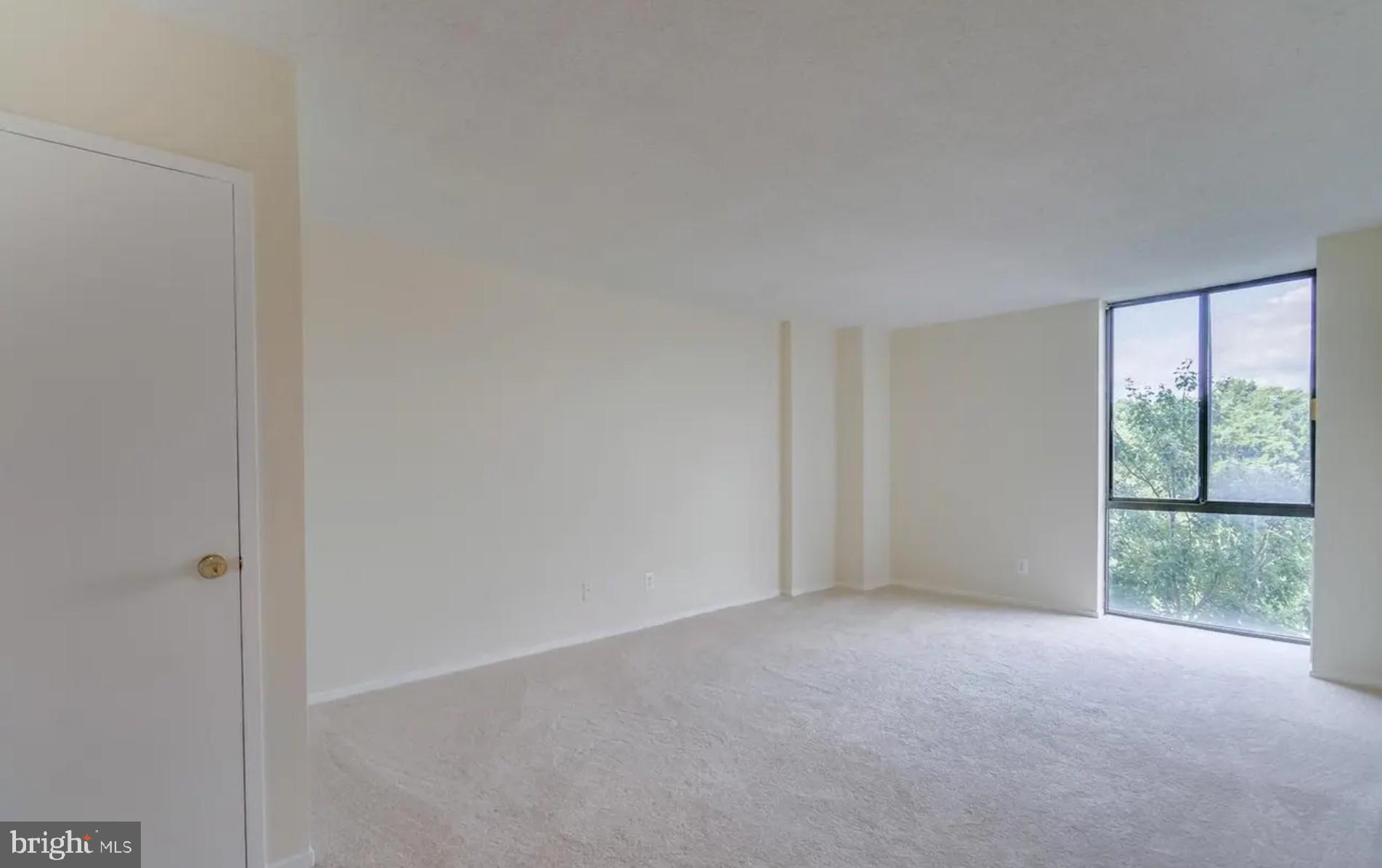 2311 Pimmit Drive, Unit 808 Falls Church, VA 22043 - Photo 20 of 24 a view of an empty room with a window