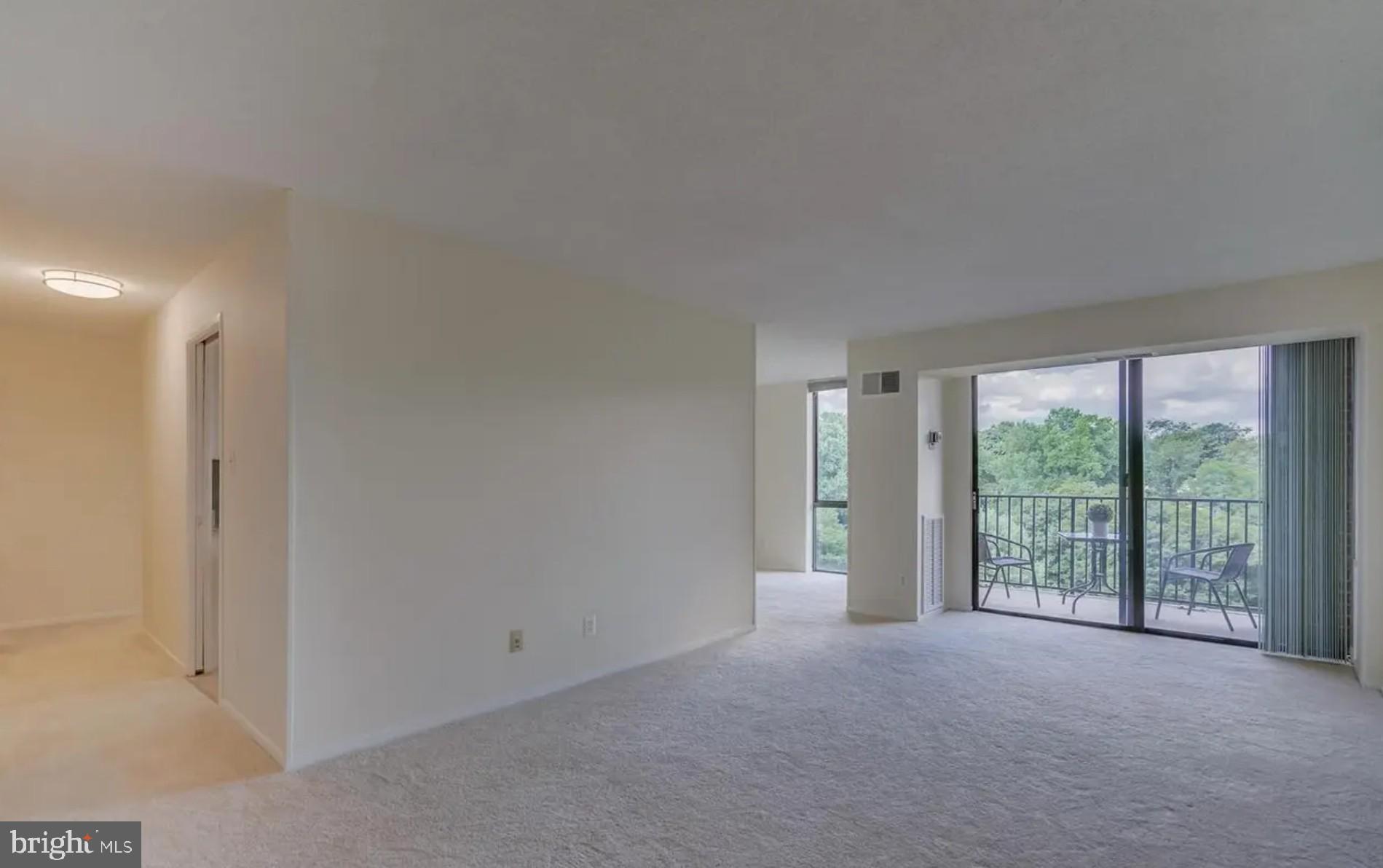 2311 Pimmit Drive, Unit 808 Falls Church, VA 22043 - Photo 5 of 24 a view of room with floor to ceiling windows
