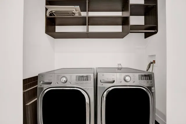 a view of cabinets and wooden floor