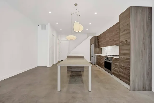 a view of workspace with furniture and natural light