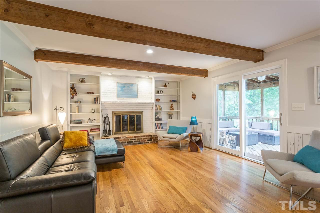 7809 Harps Mill Road Raleigh, NC 27615 - Photo 16 of 30 Beautiful Wood Beams grace the family room