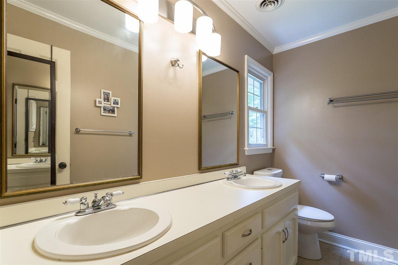 7809 Harps Mill Road Raleigh, NC 27615 - Photo 21 of 30 Updated Walk in Shower with Tile Surround