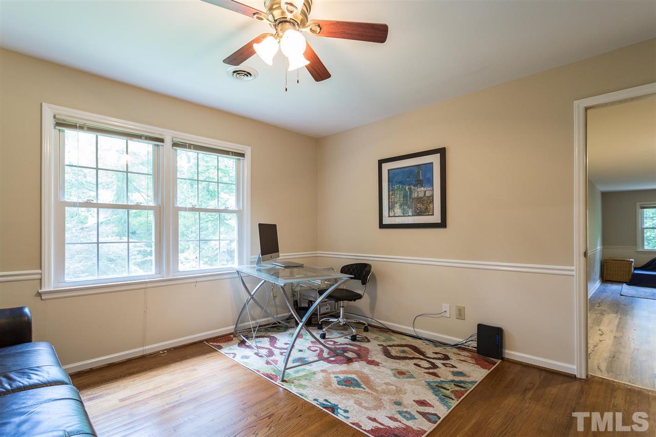 7809 Harps Mill Road Raleigh, NC 27615 - Photo 25 of 30 Bedroom #5 has hardwood floors and adjoins the bonus flex room.