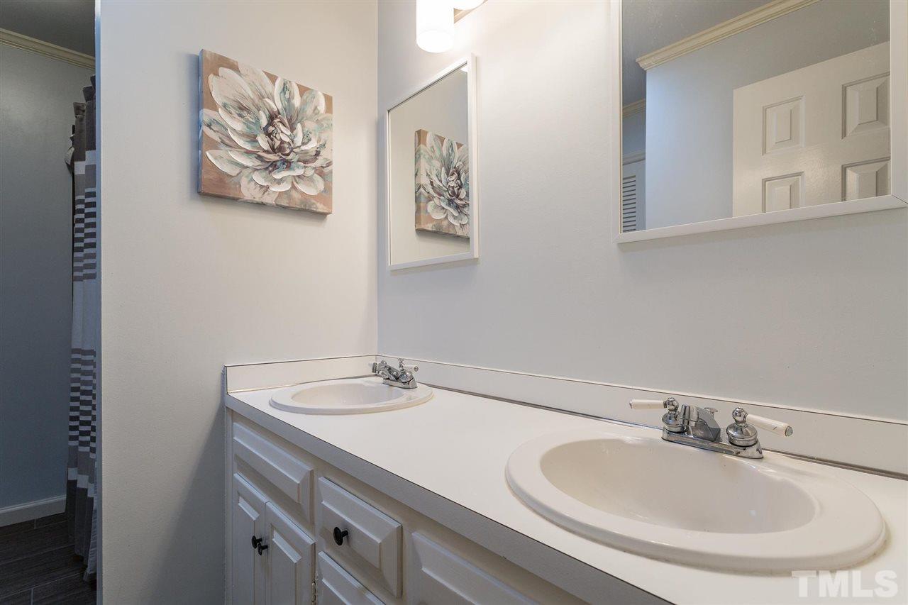 7809 Harps Mill Road Raleigh, NC 27615 - Photo 27 of 30 Tub/Shower Combination and Linen Closet
