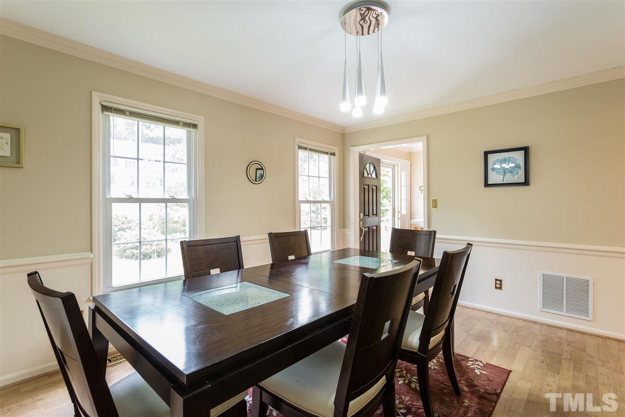 7809 Harps Mill Road Raleigh, NC 27615 - Photo 5 of 30 Crown Molding and Chair Rail