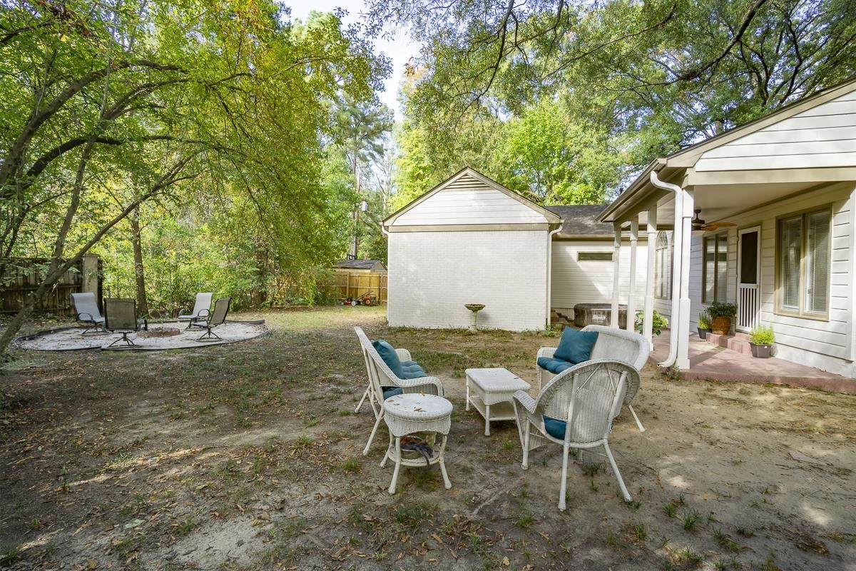 87 South Fernway Road Memphis, TN 38117 - Photo 23 of 28 a view of a house with backyard and sitting area