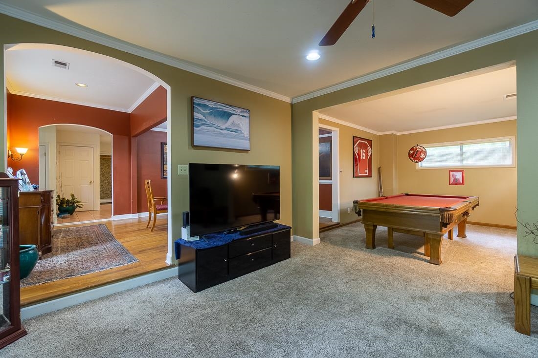 87 South Fernway Road Memphis, TN 38117 - Photo 9 of 28 a living room with furniture and a flat screen tv