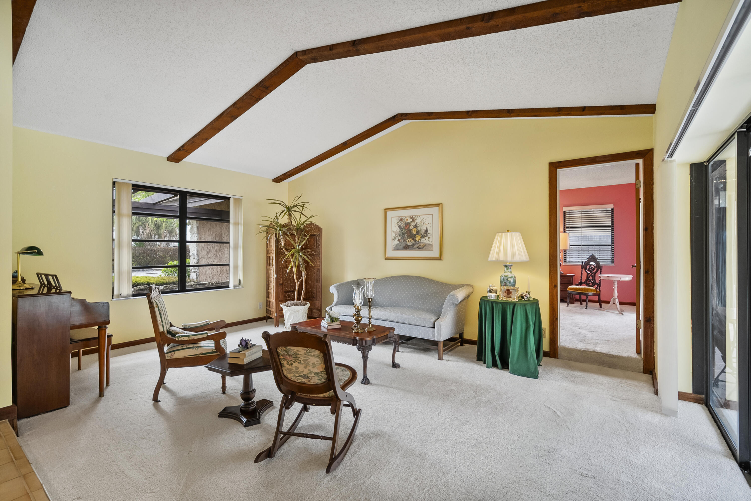 18815 South Golden Hawk Trail Jupiter, FL 33458 - Photo 15 of 49 a living room with furniture and a window