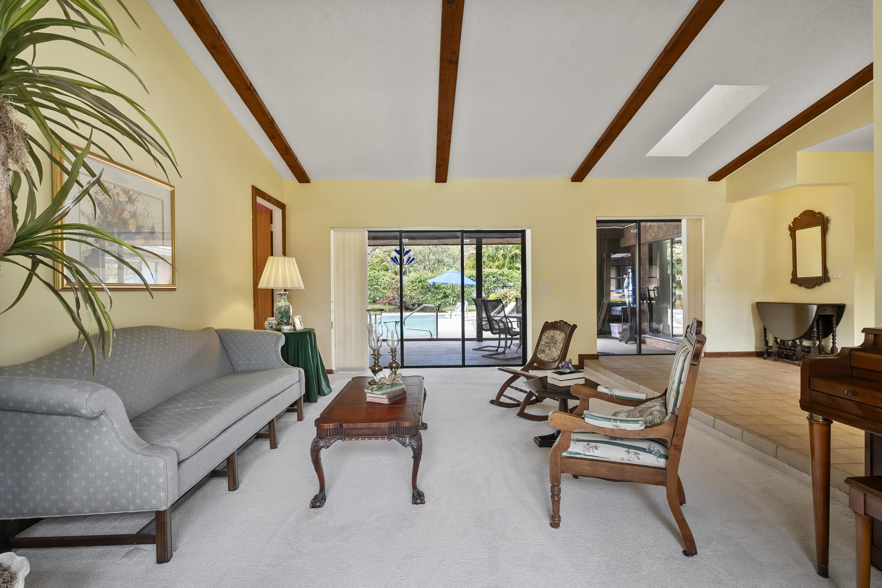 18815 South Golden Hawk Trail Jupiter, FL 33458 - Photo 16 of 49 a living room with furniture and a large window