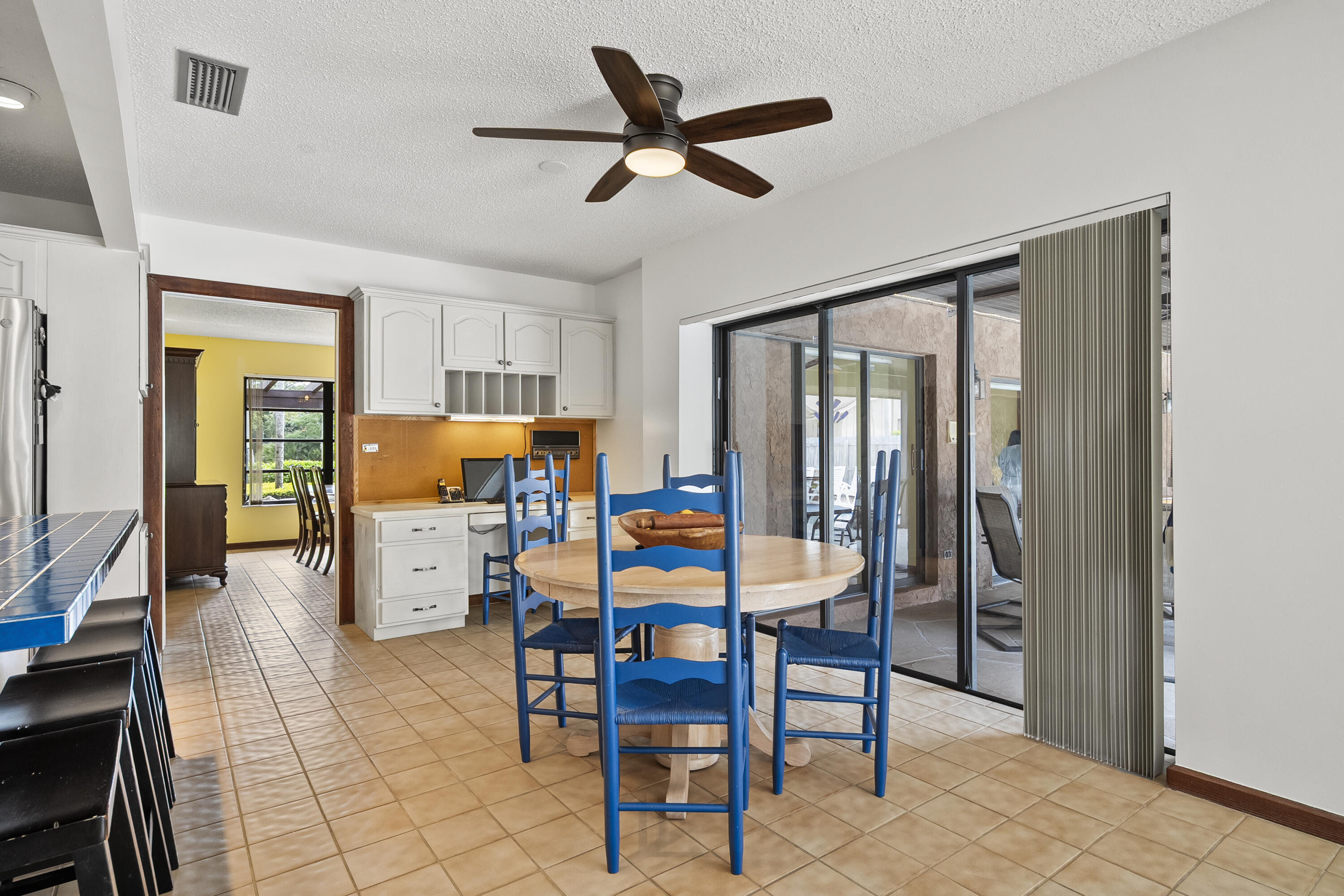 18815 South Golden Hawk Trail Jupiter, FL 33458 - Photo 19 of 49 a dining room with furniture and window