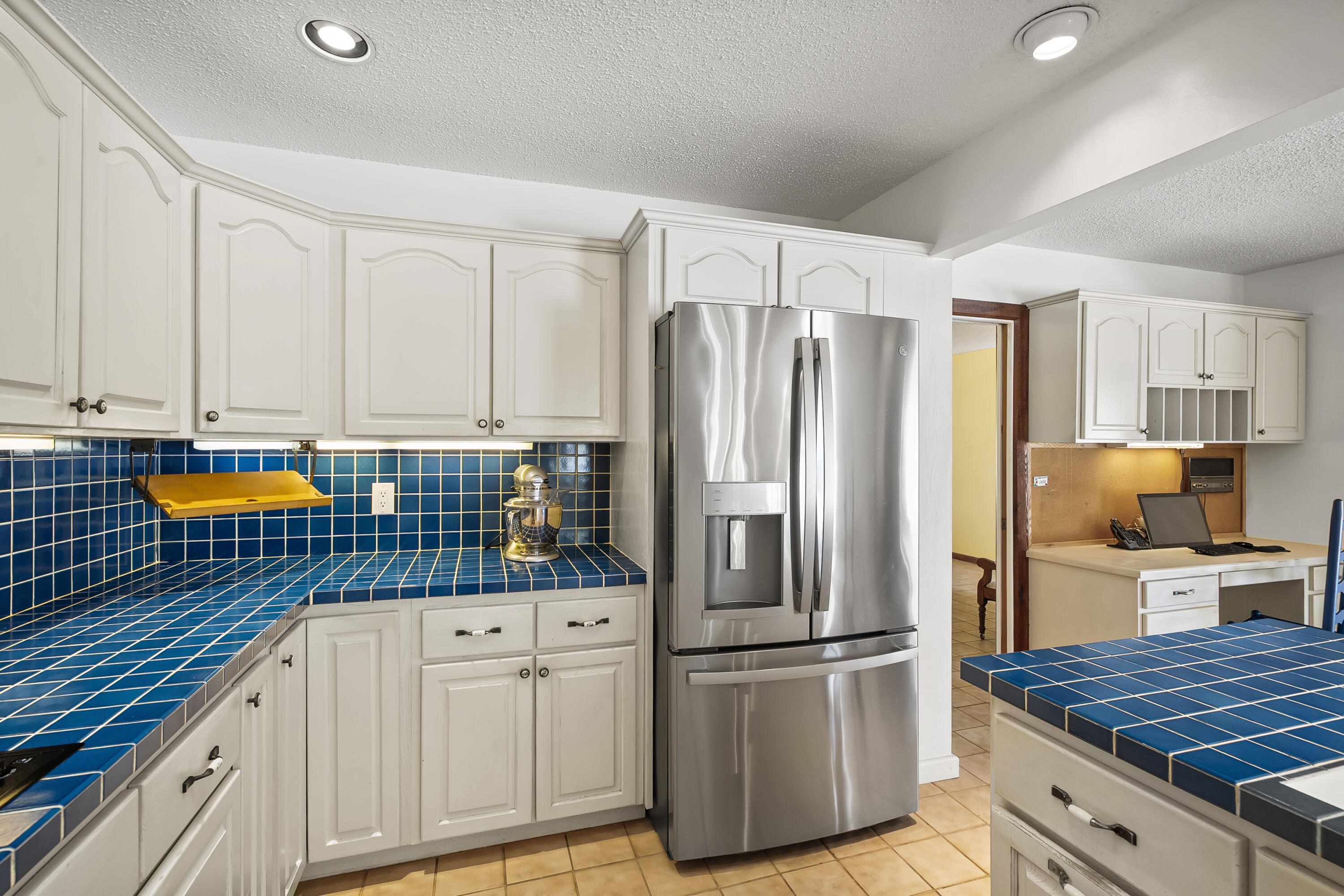 18815 South Golden Hawk Trail Jupiter, FL 33458 - Photo 23 of 49 a kitchen with stainless steel appliances granite countertop a refrigerator sink and cabinets