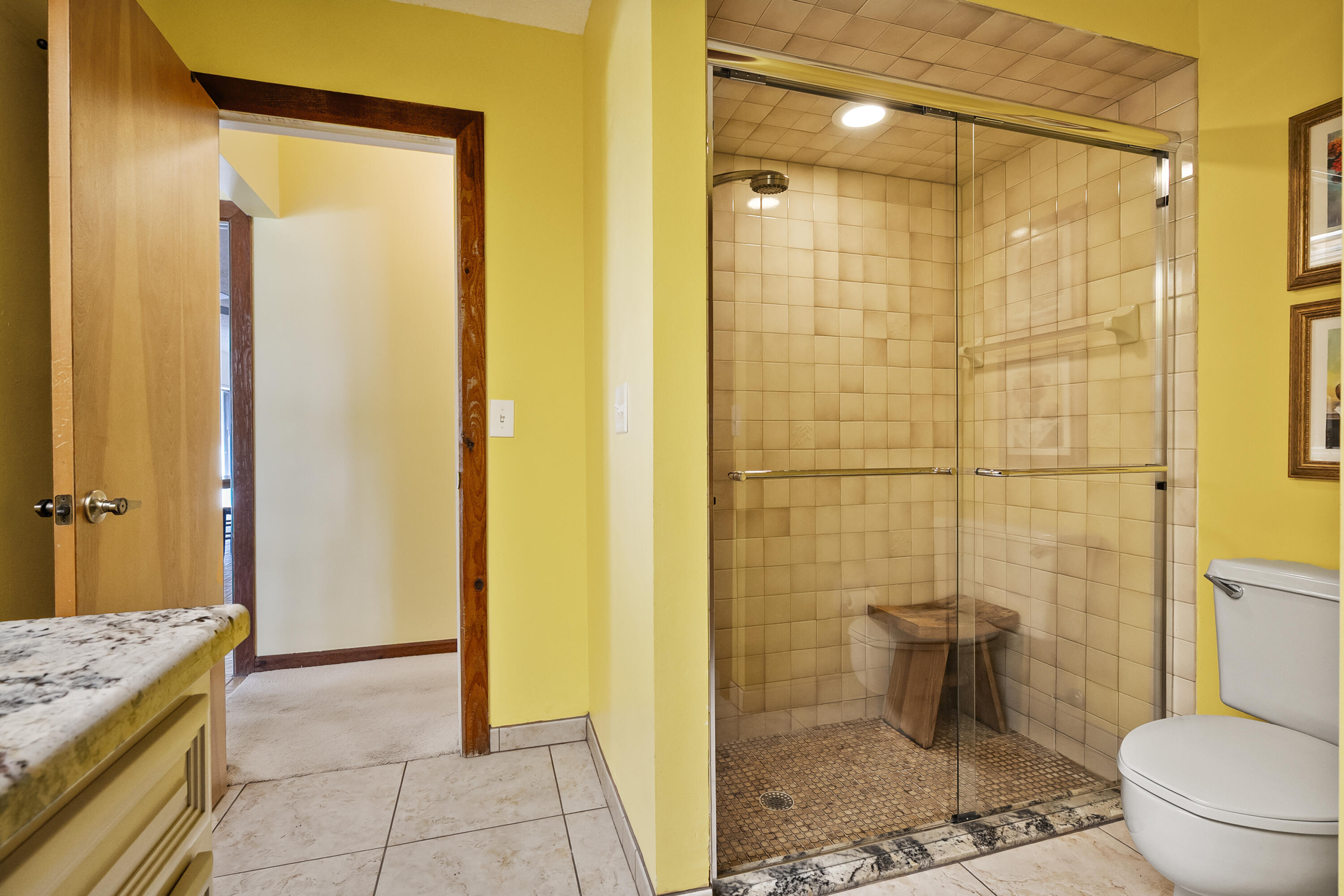 18815 South Golden Hawk Trail Jupiter, FL 33458 - Photo 39 of 49 a bathroom with a granite countertop shower and a toilet