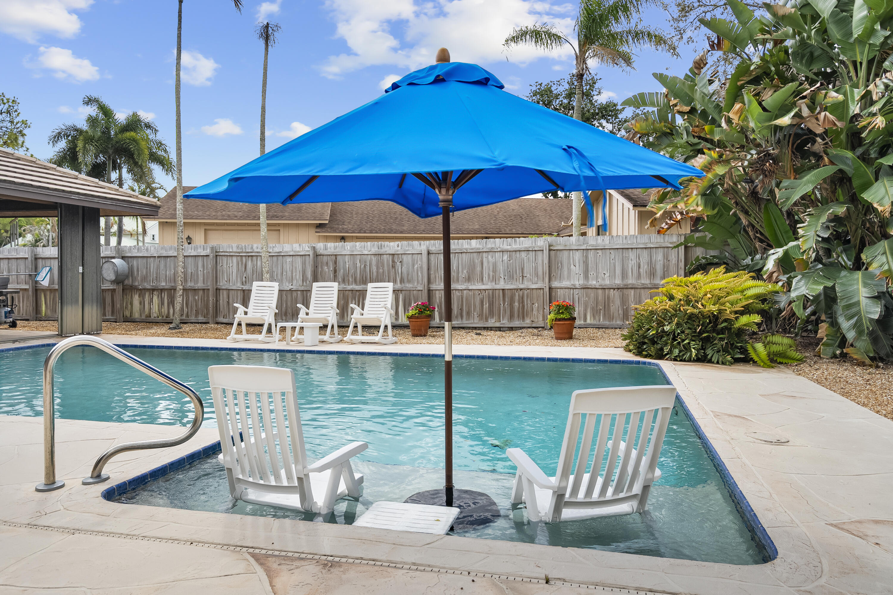 18815 South Golden Hawk Trail Jupiter, FL 33458 - Photo 6 of 49 a view of a chairs and table in the patio