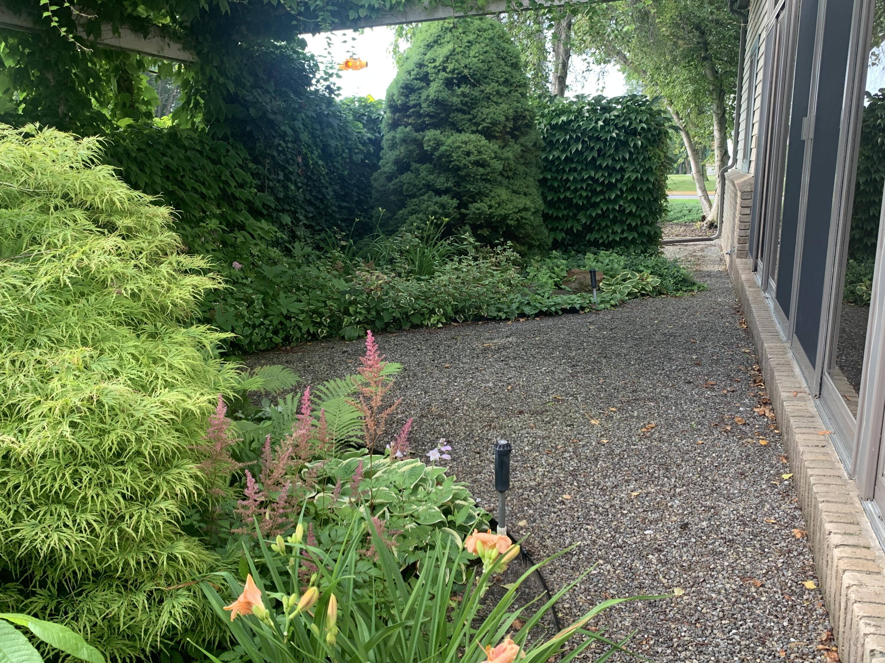 316 8th Street Manistee, MI 49660 - Photo 23 of 34 Courtyard 1