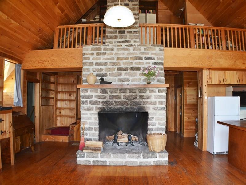 230 Minturn Road Swans Island, ME 04685 - Photo 9 of 18 Central chimney with cathedral...