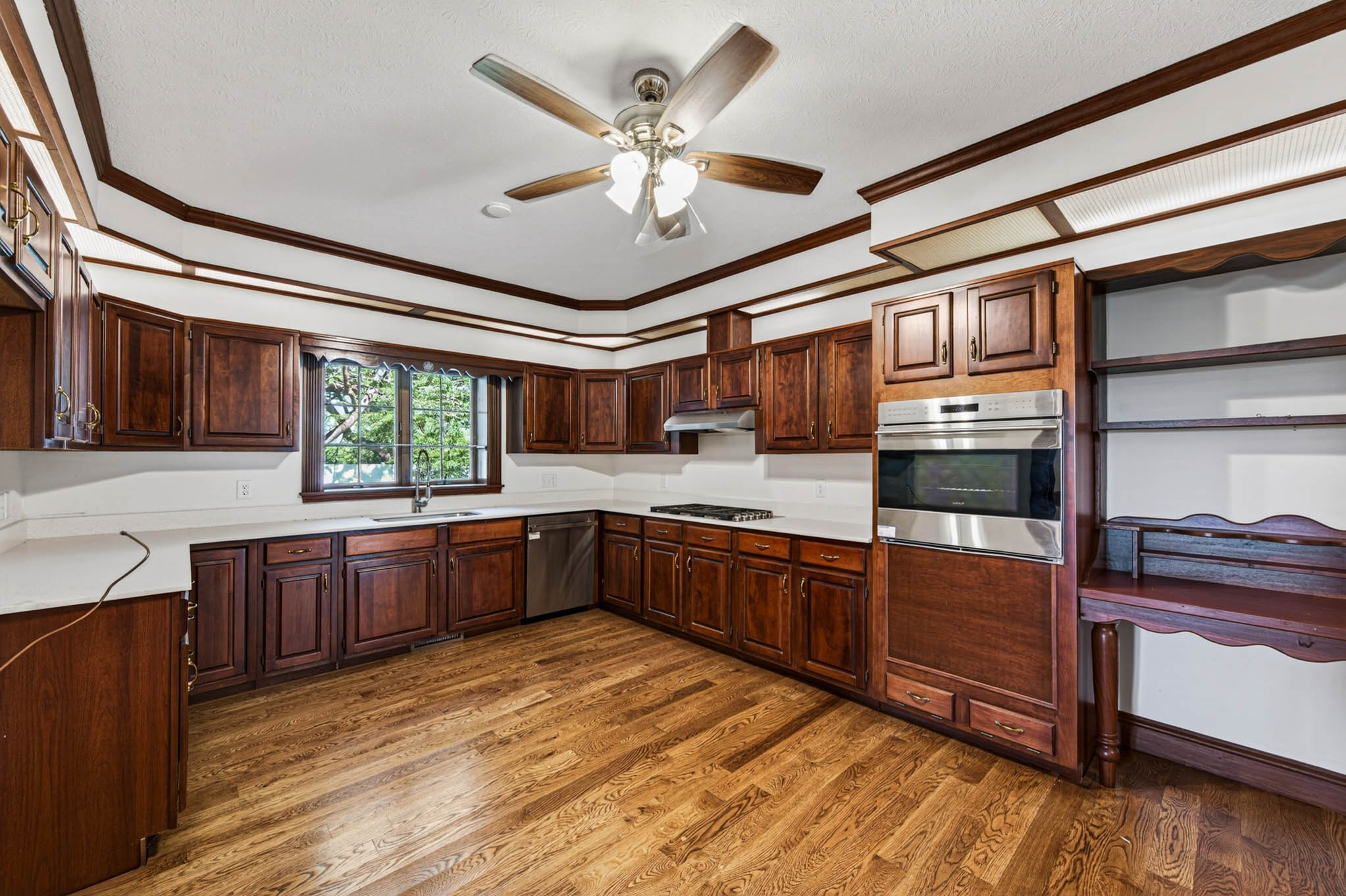1800 Plano Road Bowling Green, KY 42104 - Photo 11 of 47 a large kitchen with stainless steel appliances granite countertop a stove and cabinets