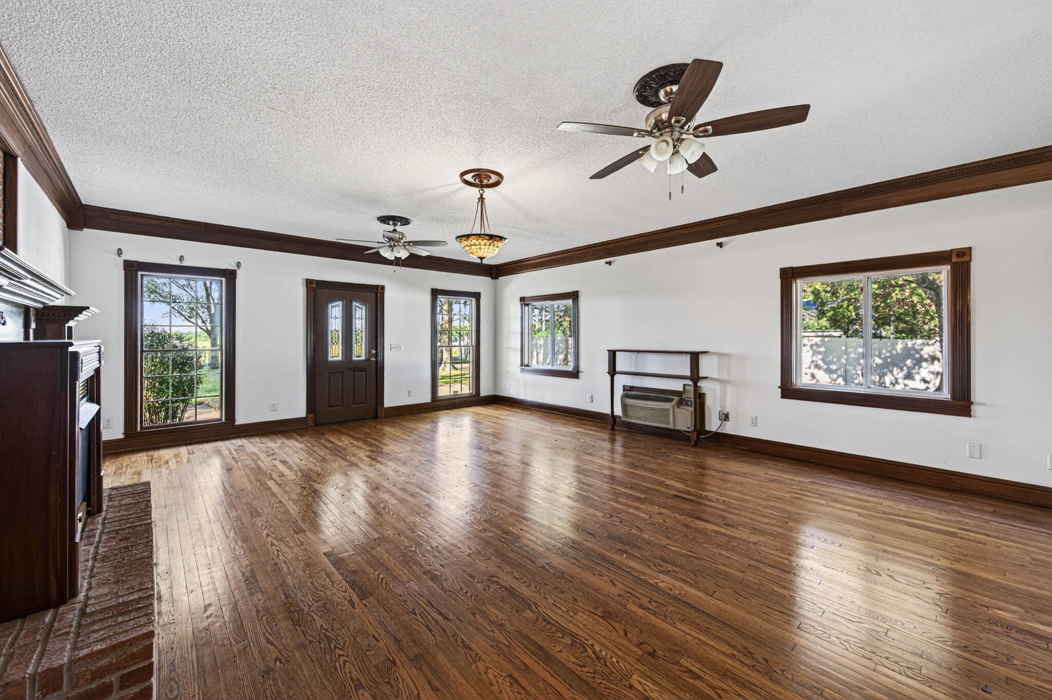 1800 Plano Road Bowling Green, KY 42104 - Photo 12 of 47 a view of an empty room with a window and wooden floor