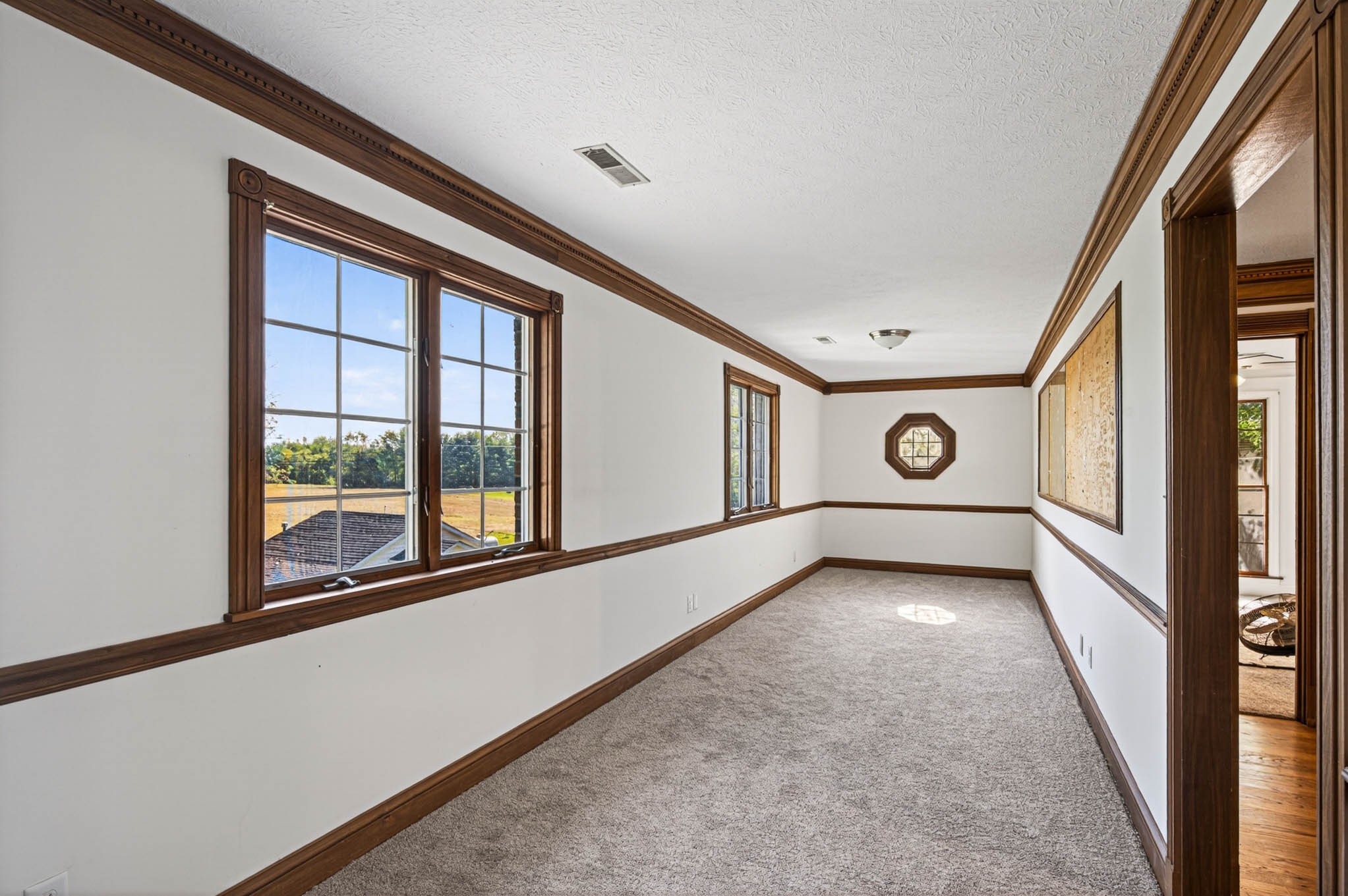 1800 Plano Road Bowling Green, KY 42104 - Photo 25 of 47 a view of a hallway with windows