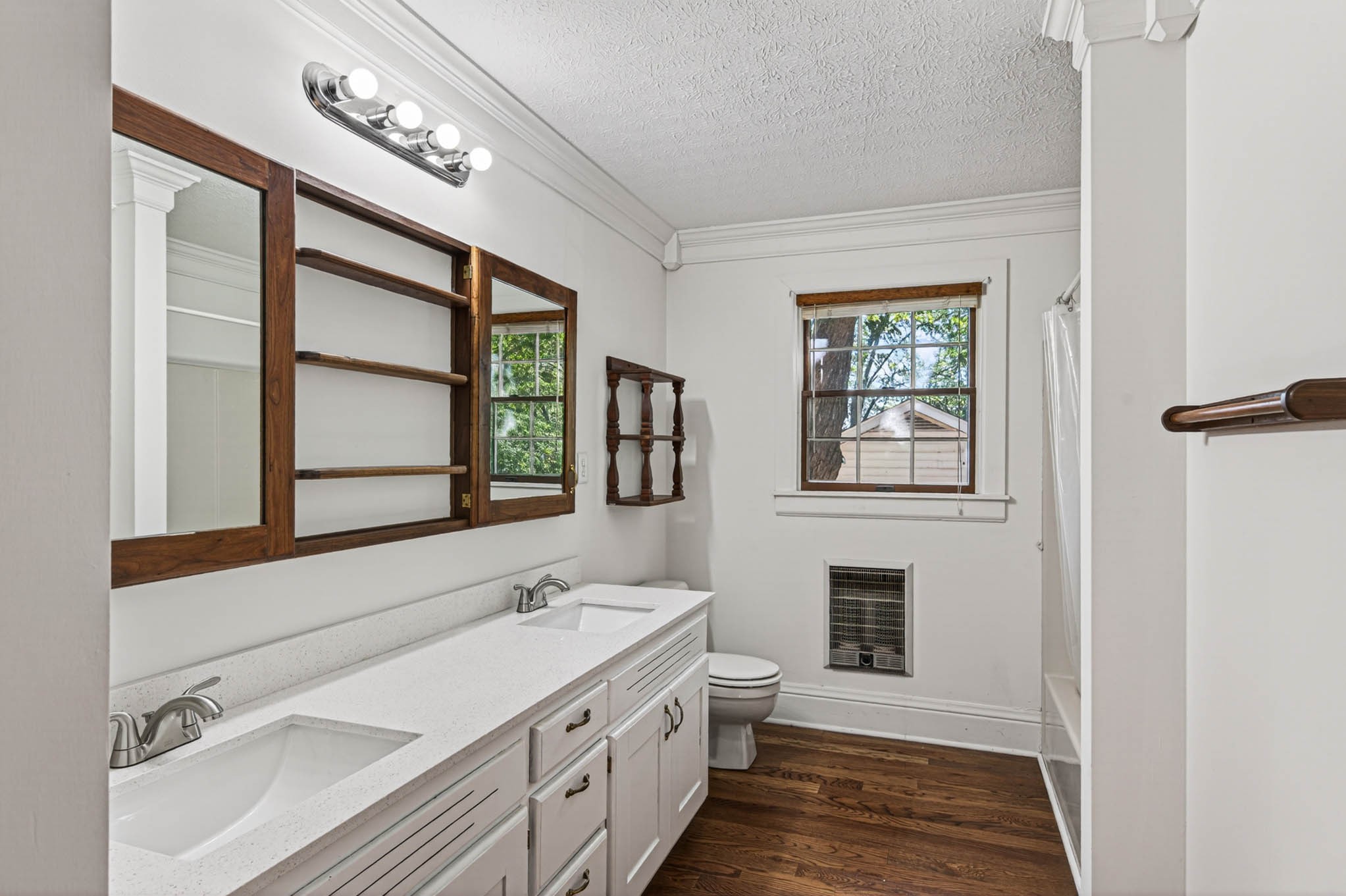 1800 Plano Road Bowling Green, KY 42104 - Photo 28 of 47 a bathroom with a double vanity sink a mirror and a window