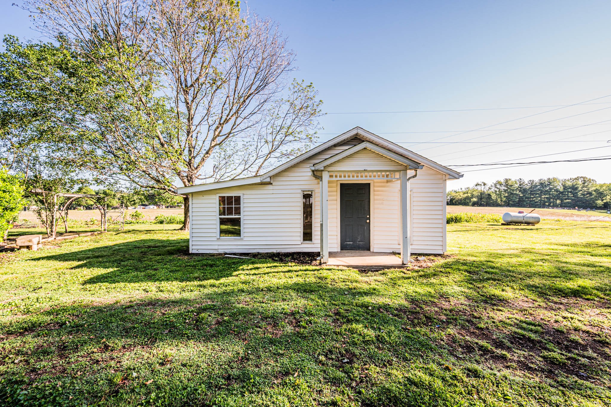 1800 Plano Road Bowling Green, KY 42104 - Photo 35 of 47 a view of a house with a yard and trees