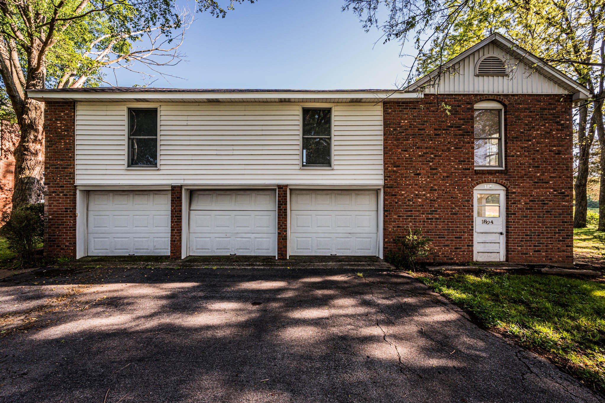 1800 Plano Road Bowling Green, KY 42104 - Photo 39 of 47 a front view of a house with a yard