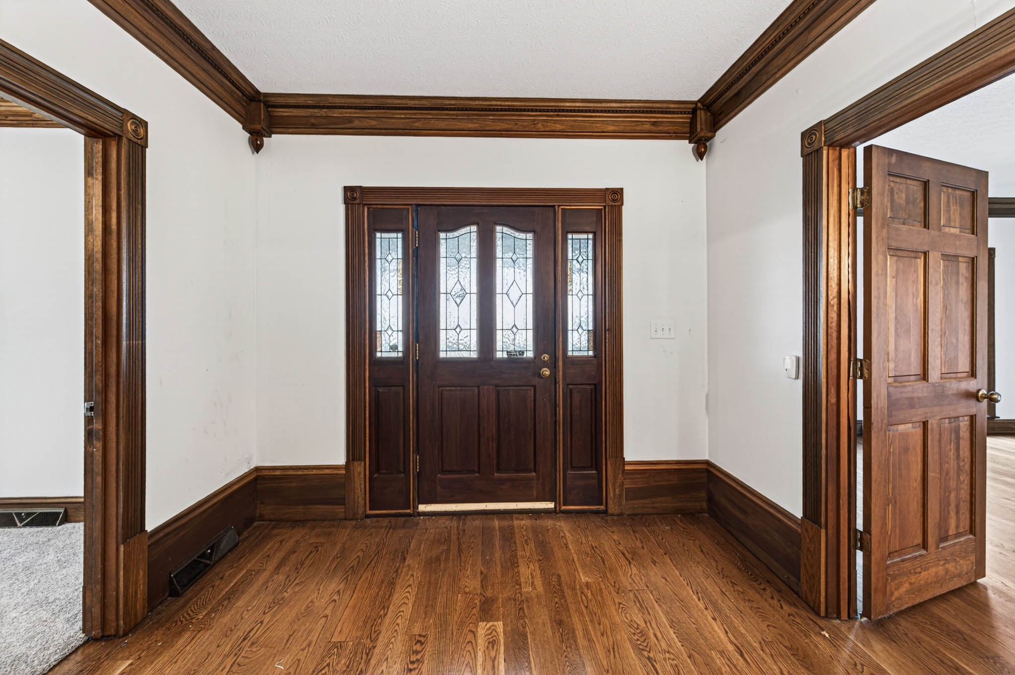 1800 Plano Road Bowling Green, KY 42104 - Photo 6 of 47 a view of an empty room with wooden floor and a window