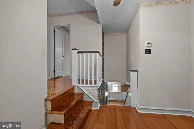 a view of entryway with wooden floor