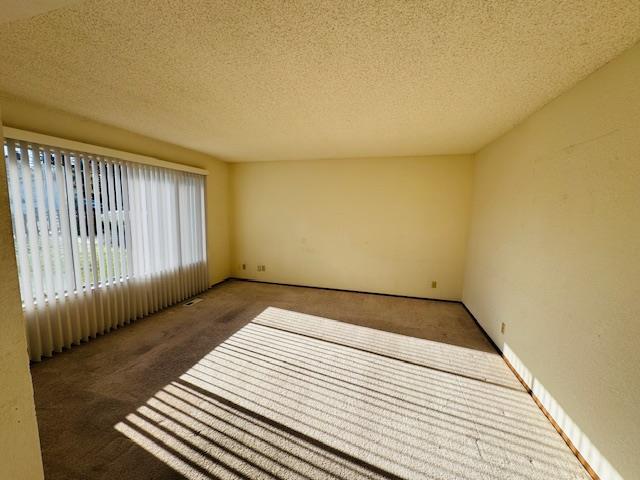 3003 Crescent Street Marina, CA 93933 - Photo 3 of 20 a view of a room with wooden floor and bench