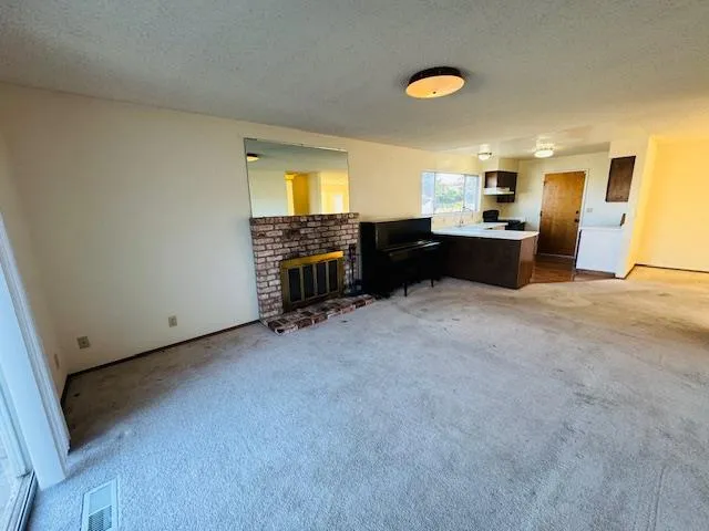 a view of a room with wooden door