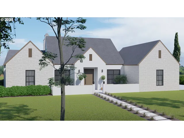 a black and white house with a yard