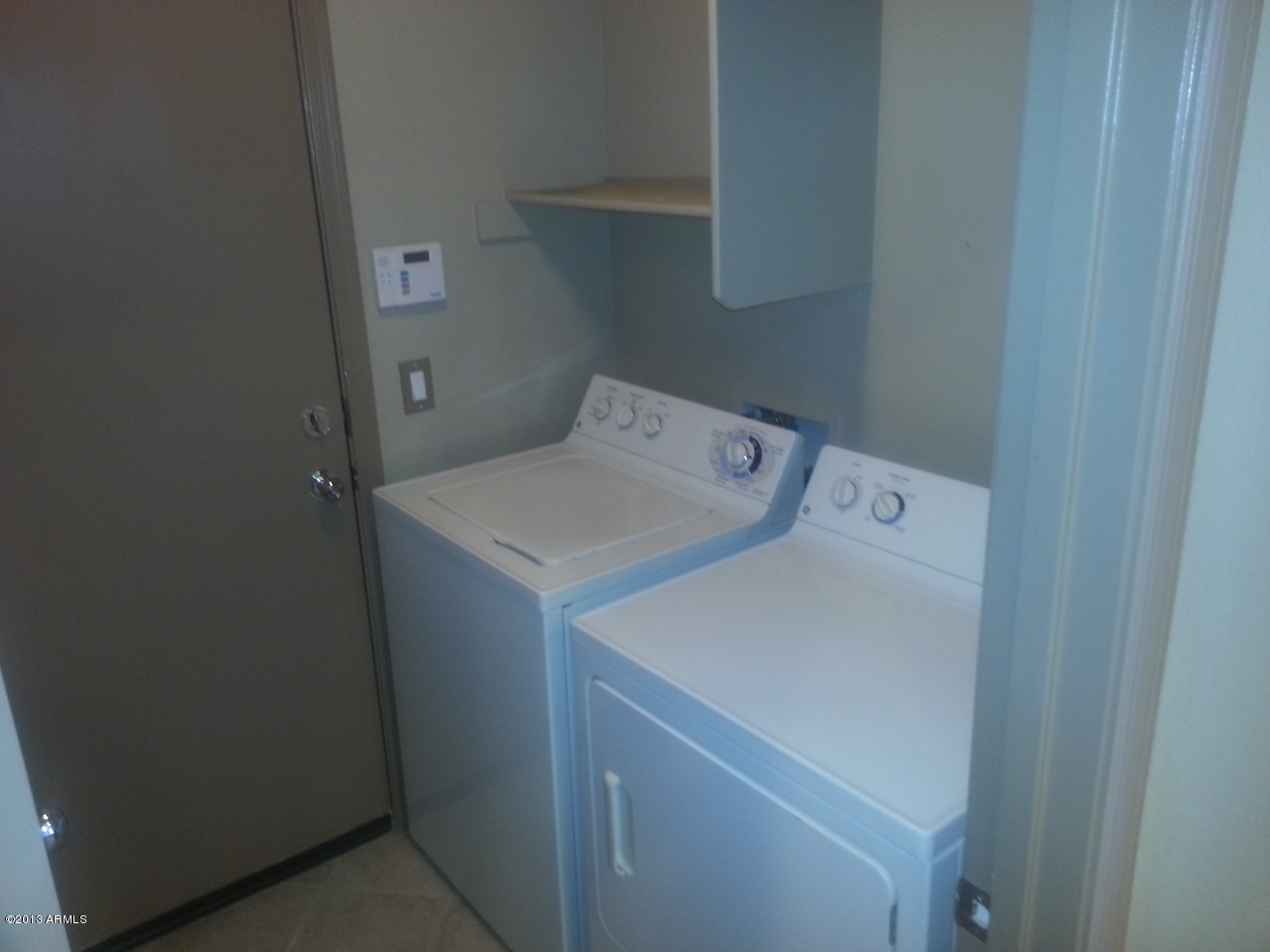 44395 Cypress Lane Maricopa, AZ 85138 - Photo 10 of 20 a utility room with dryer and washer