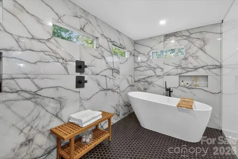a view of an empty room with a bathroom