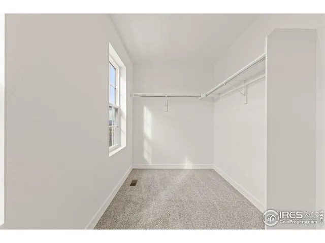 a bathroom with a granite countertop sink mirror and double