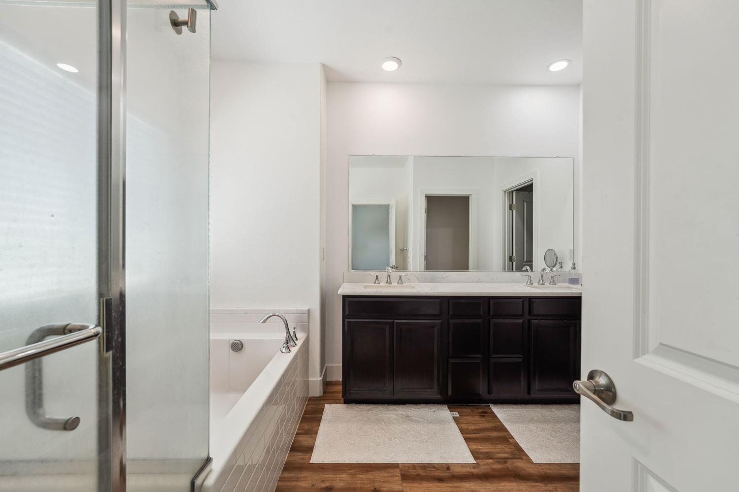 2074 Abbeylane Way Olivehurst, CA 95961 - Photo 15 of 39 a bathroom with a sink and a mirror