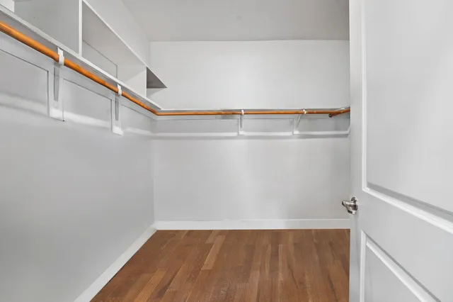 a view of an empty walk in closet