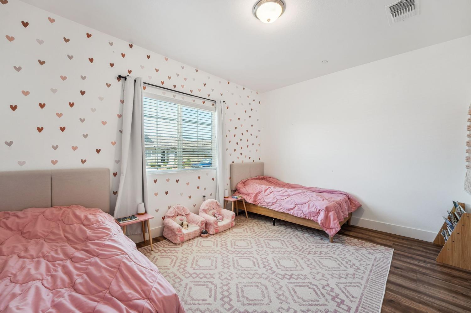 2074 Abbeylane Way Olivehurst, CA 95961 - Photo 18 of 39 a bedroom with a bed and a window