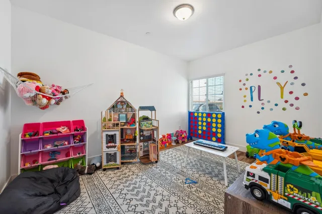 a bedroom with lots of baby toys