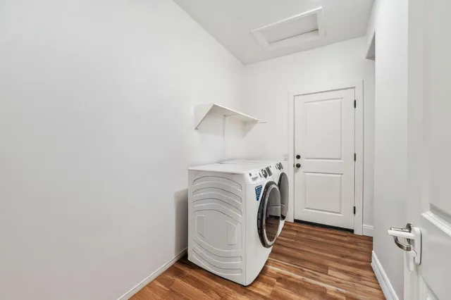 a utility room with dryer and washer