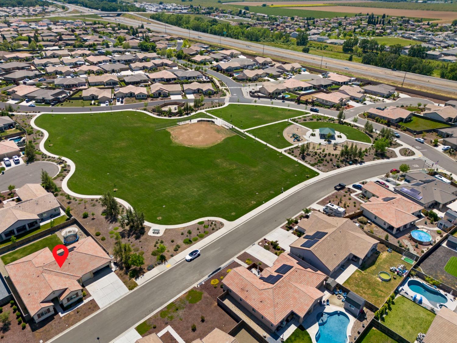2074 Abbeylane Way Olivehurst, CA 95961 - Photo 38 of 39 an aerial view of a tennis ground and a cars park side of the view