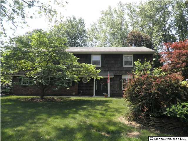 26 Turnberry Drive Lincroft, NJ 07738 - Photo 16 of 16 a view of a house with a yard