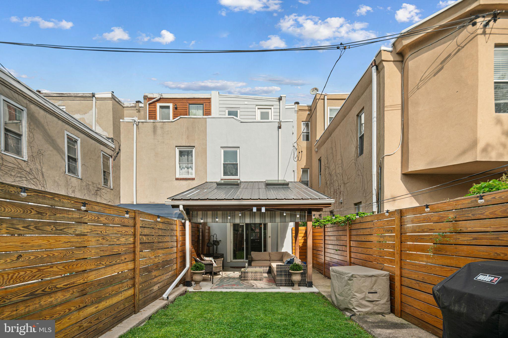 1330 South 16th Street Philadelphia, PA 19146 - Photo 11 of 37 a view of a patio with table and chairs and potted plants