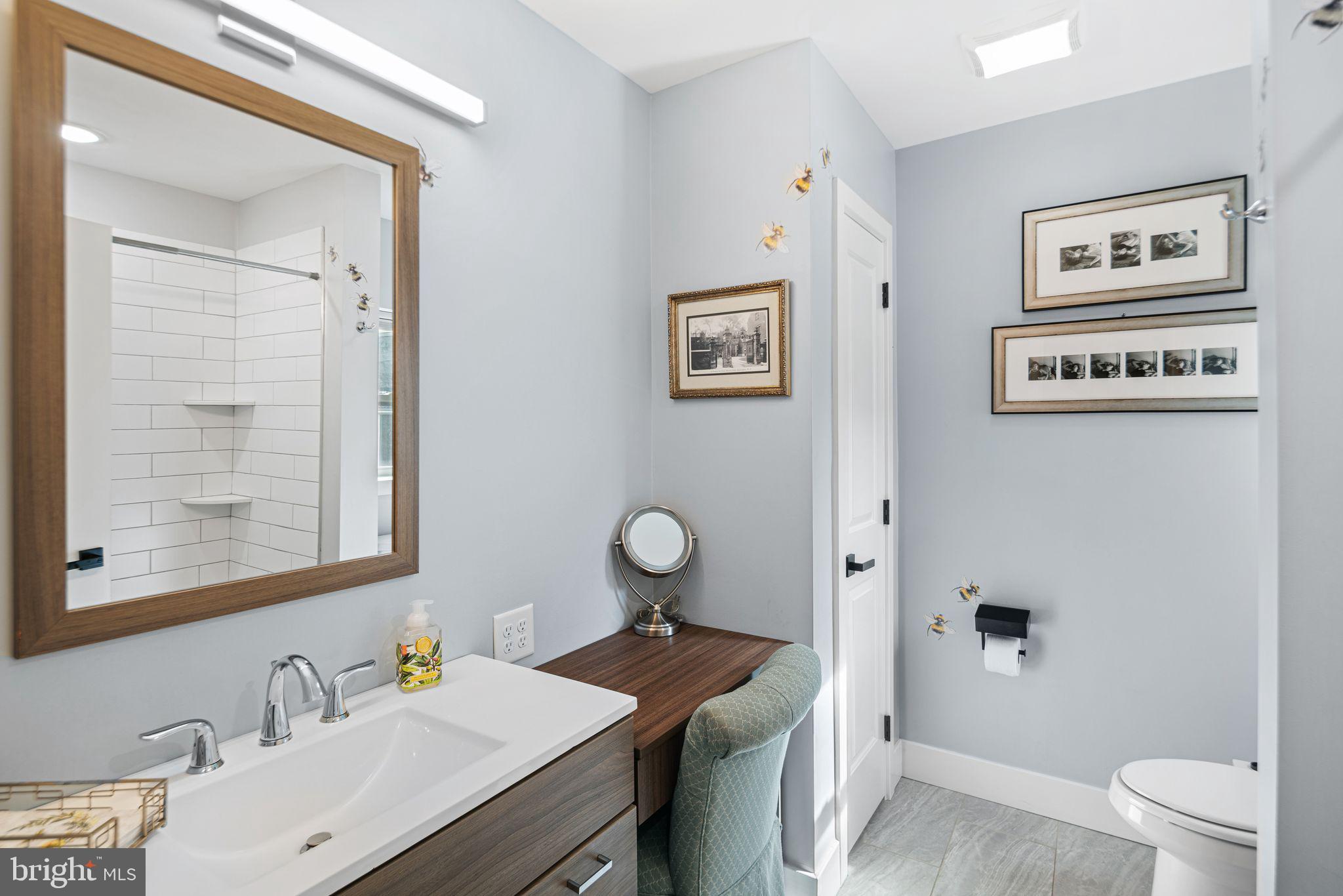 1330 South 16th Street Philadelphia, PA 19146 - Photo 16 of 37 a bathroom with a sink toilet and shower
