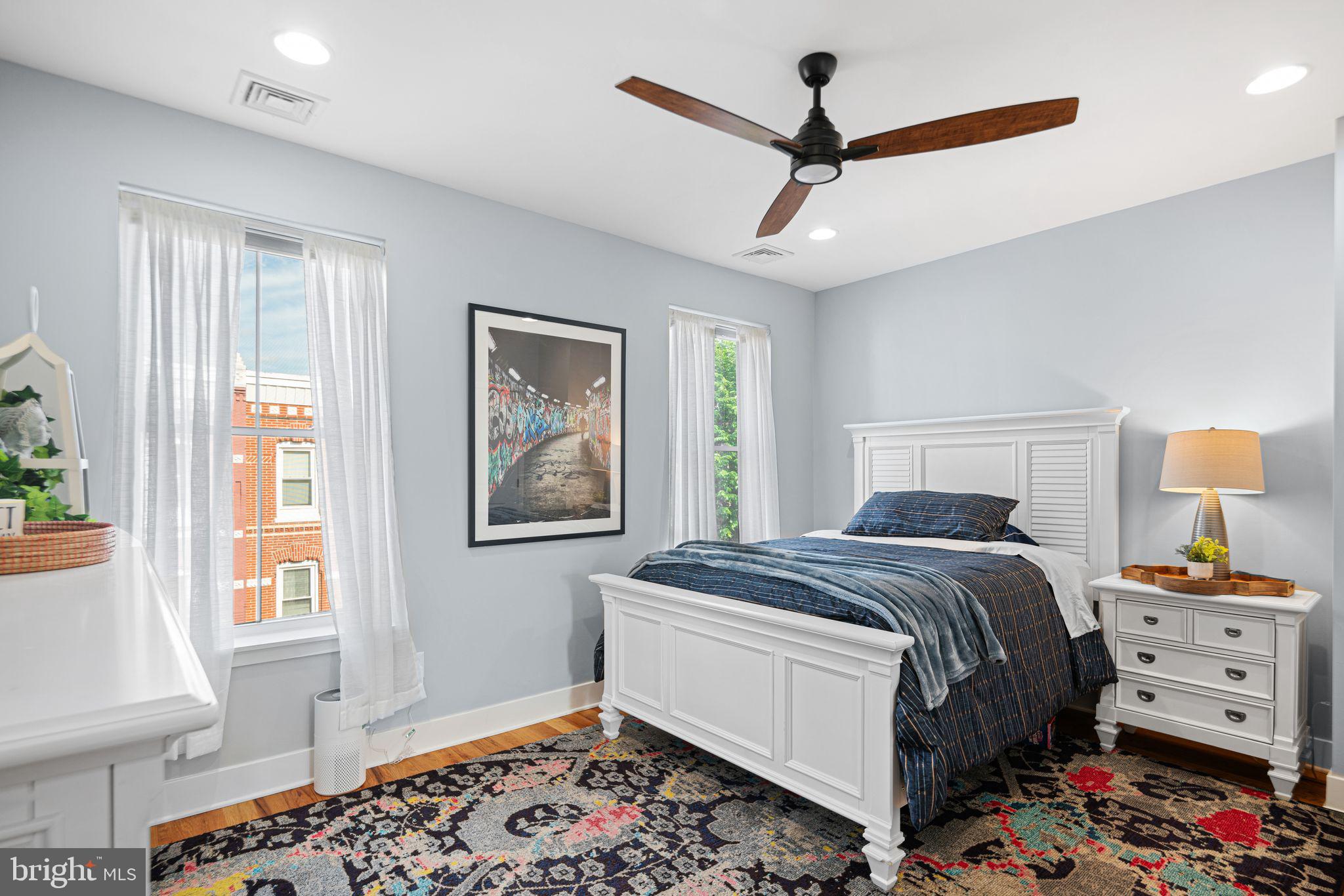 1330 South 16th Street Philadelphia, PA 19146 - Photo 20 of 37 a bedroom with a bed and a window