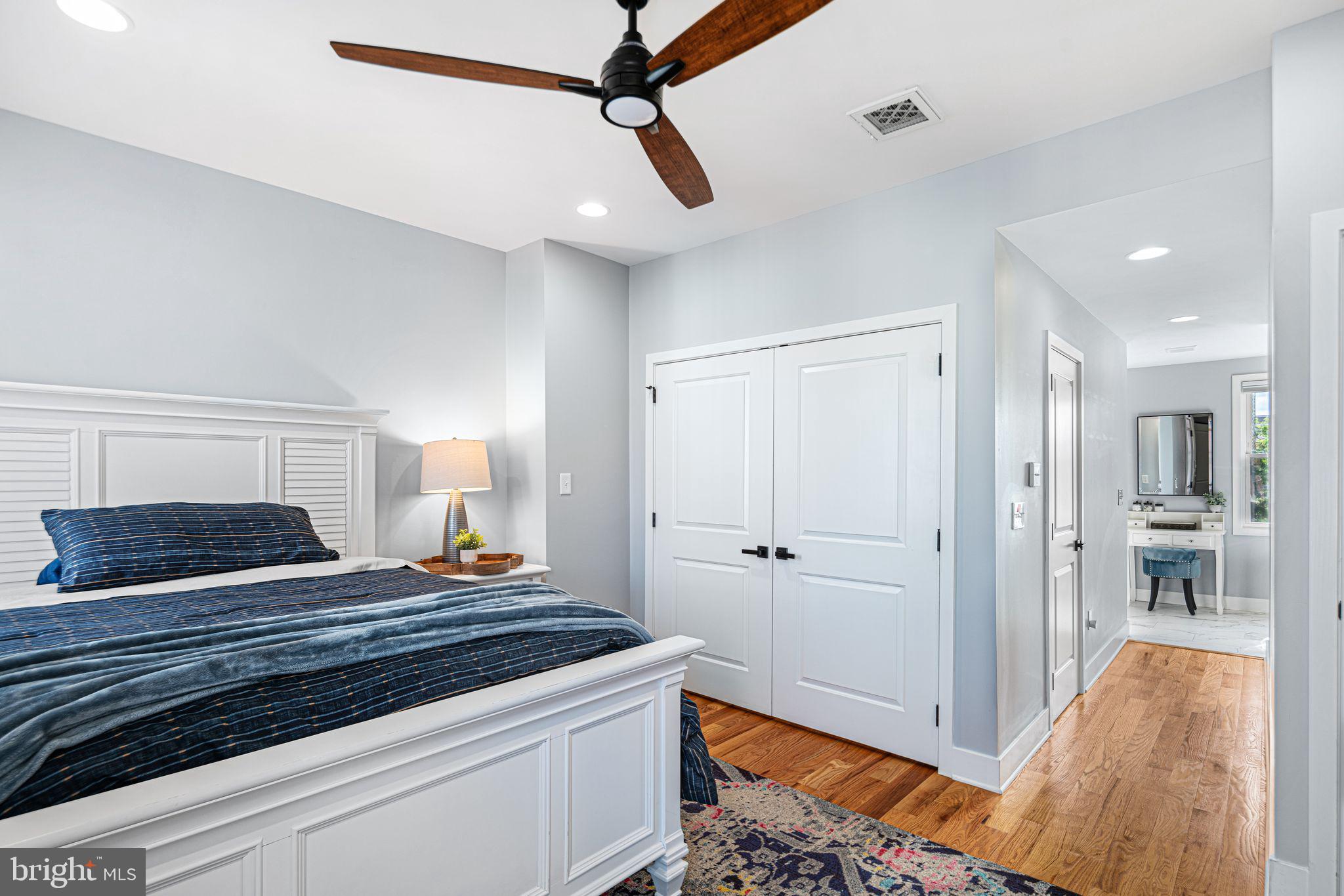 1330 South 16th Street Philadelphia, PA 19146 - Photo 21 of 37 a bedroom with a bed and a view of bathroom
