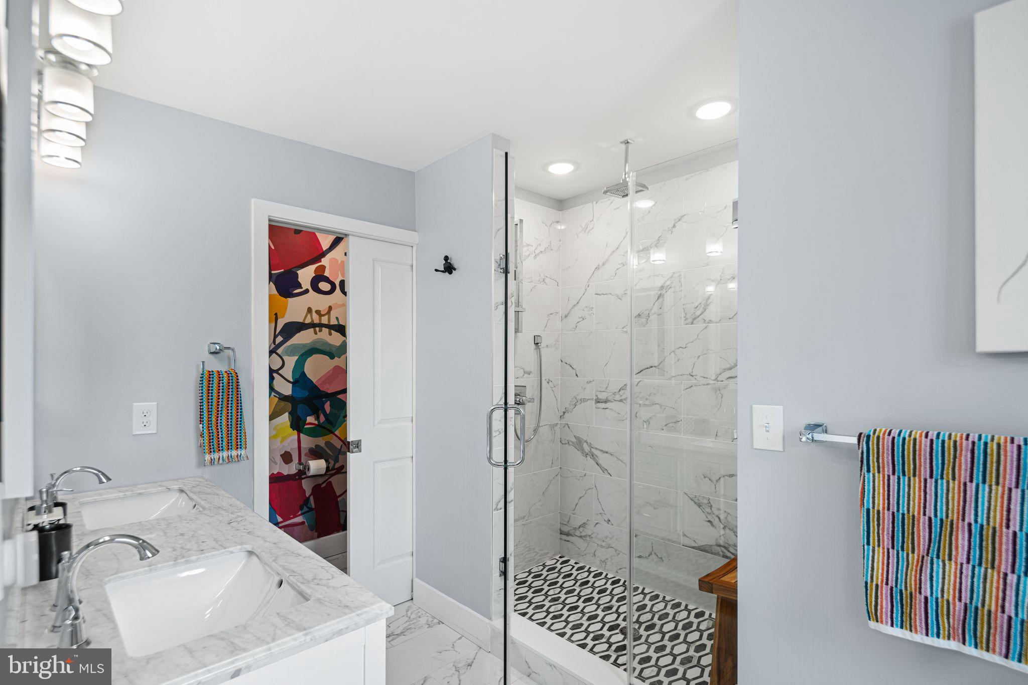 1330 South 16th Street Philadelphia, PA 19146 - Photo 25 of 37 a bathroom with a sink and a shower