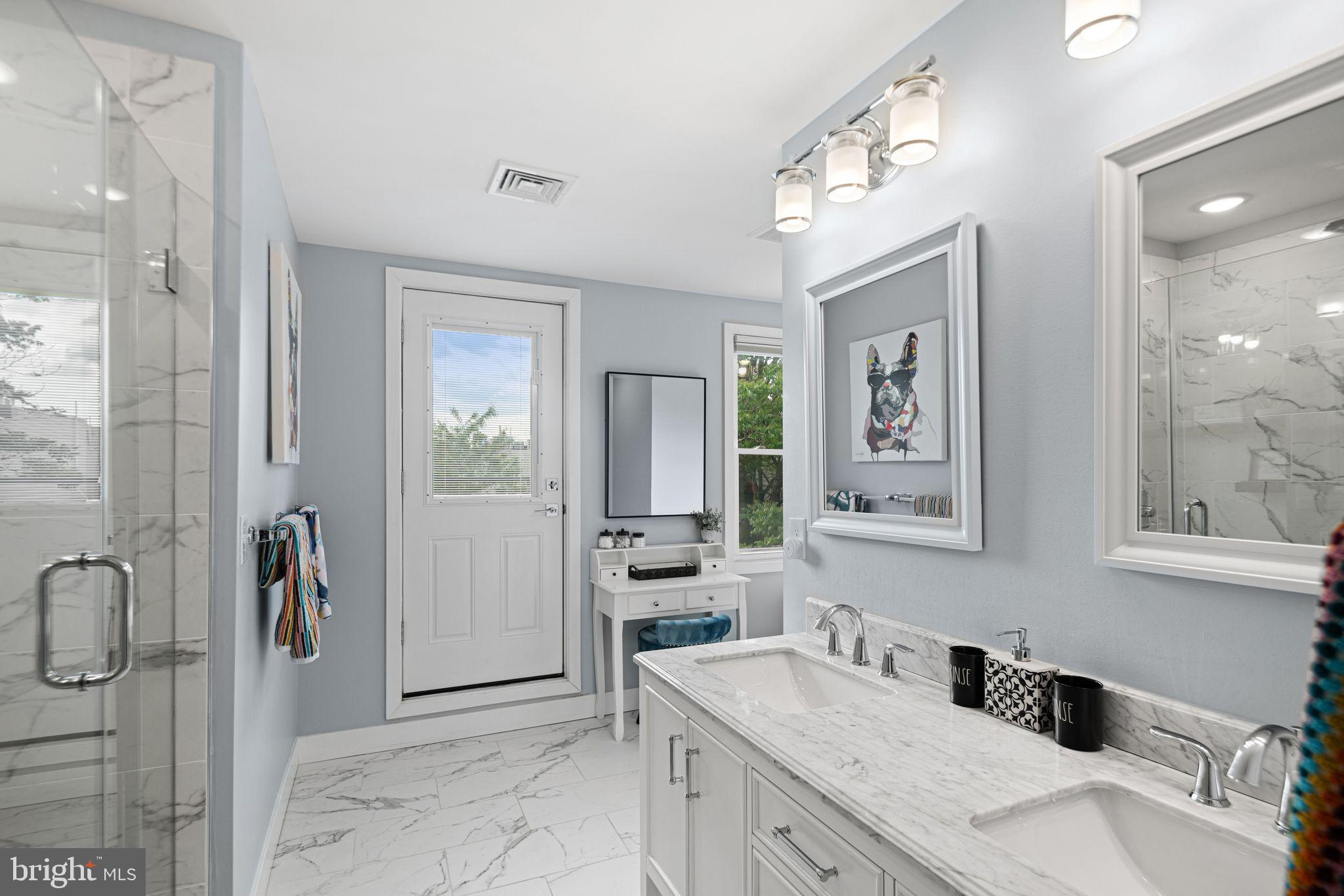 1330 South 16th Street Philadelphia, PA 19146 - Photo 26 of 37 a bathroom with a sink and a mirror